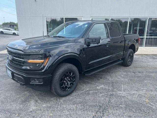 2026 Ford F-150 XLT in Agate Black Metallic — front three-quarter view